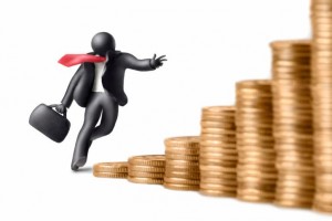 Plasticine businessman figure running upstairs the stacks of coins